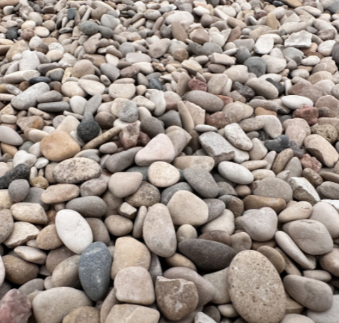 Гравий и Галька: различия и применение в ландшафтном дизайне и строительстве